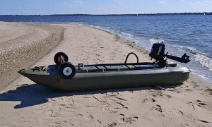 beached S4 microskiff with transportation wheels